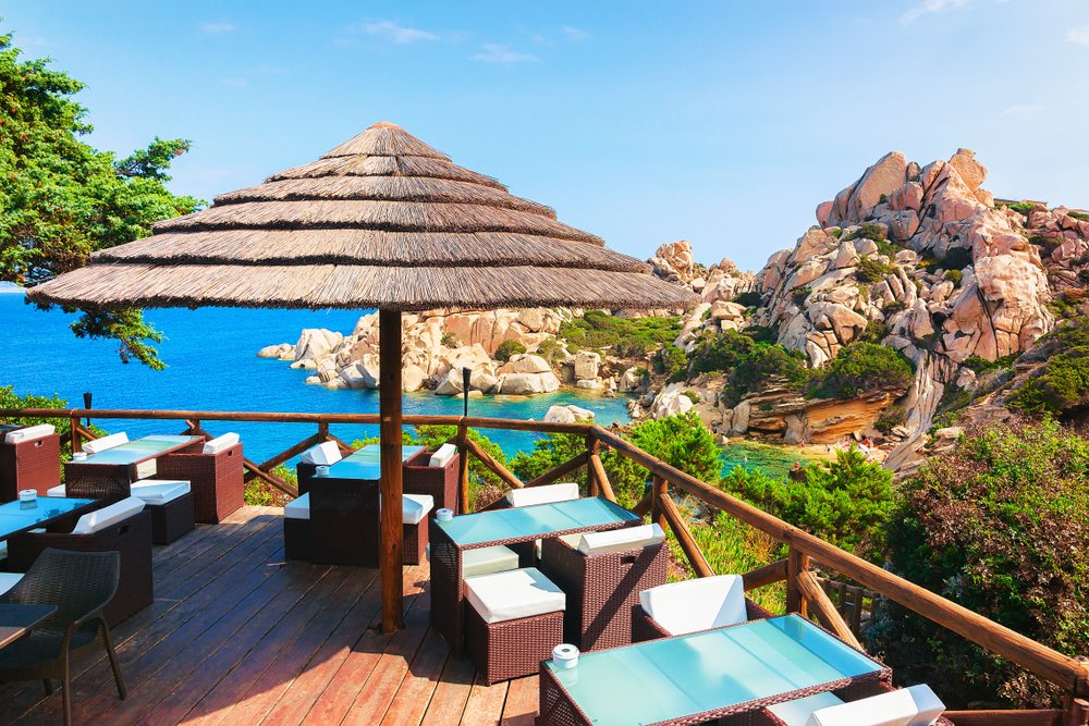 Street cafe in Capo Testa, Santa Teresa Gallura in Sardinia, overlooking the sea and beautiful rock formations