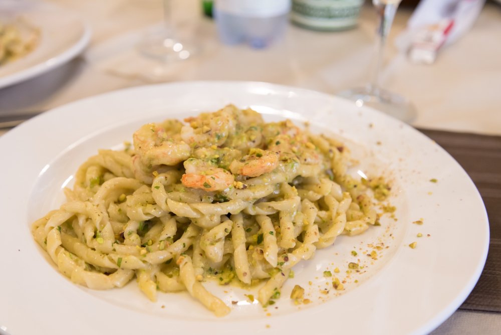 Busiate noodles with pistachio pesto and shrimps served in a cooking class in Palermo Sicily