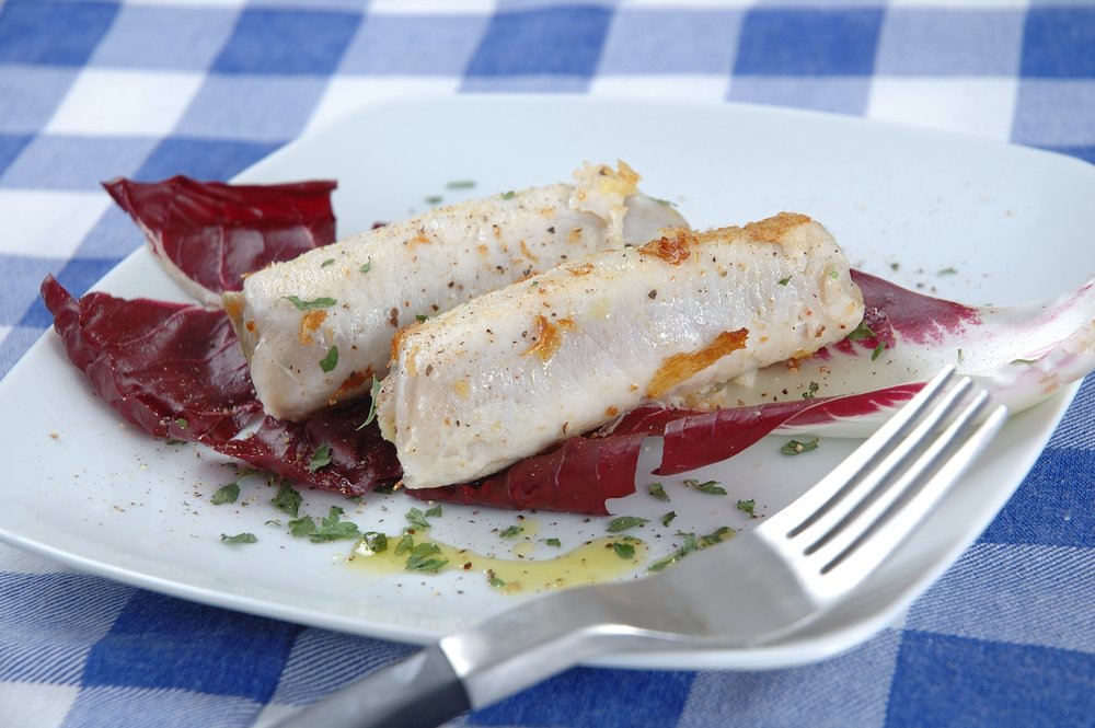 Swordfish involtini, cooked and turned into a 'roll' served on a bed of treviso