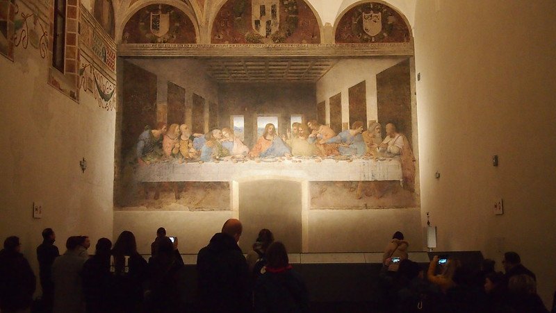 dark shot of the interior of the last supper with limited lighting in order to not further deteriorate the painting which is already in disrepair