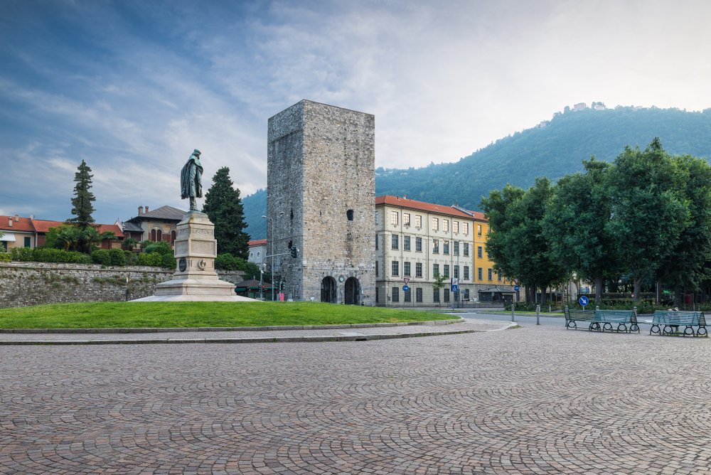 Como city's historic center with a picturesque view of the square Vittoria and its medieval tower called Porta Torre.