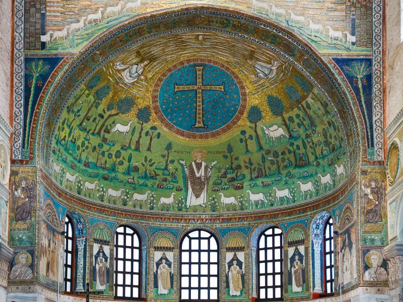 The mosaics in the city of Ravenna. The mosaics depict a biblical figure and sheep around it, and other saints and religious figures.