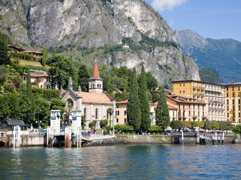 The historic village of Cadenabbia on the lakeside of Como with historic church and old buildings