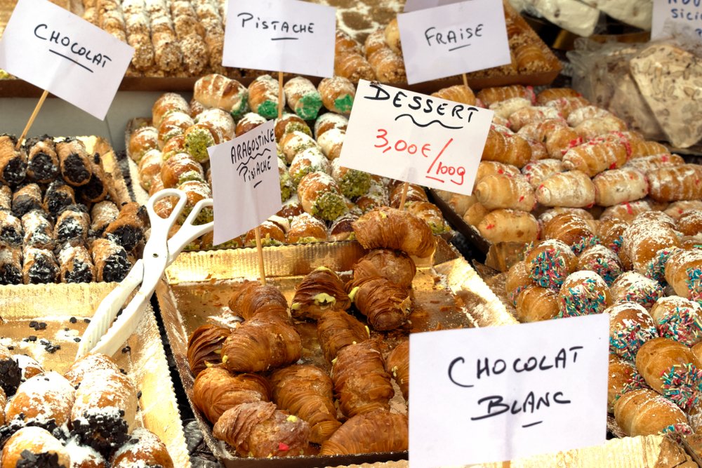 Various french sweets for sale in an avignon market