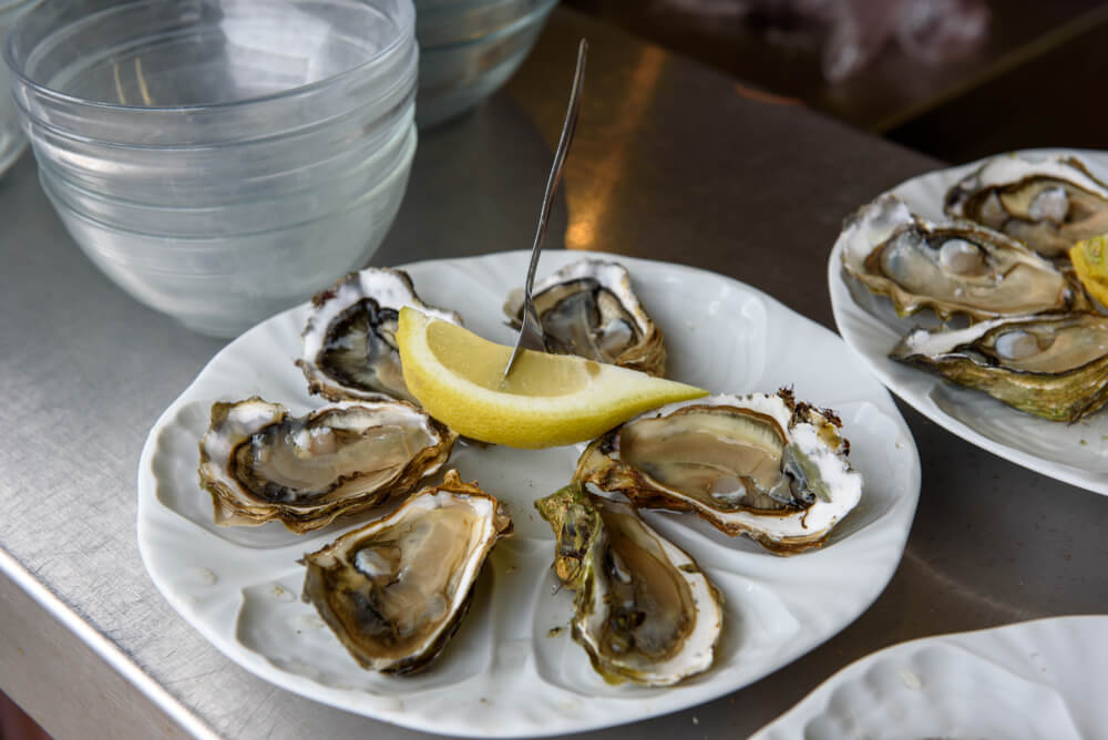 oysters with lemon in bordeaux market