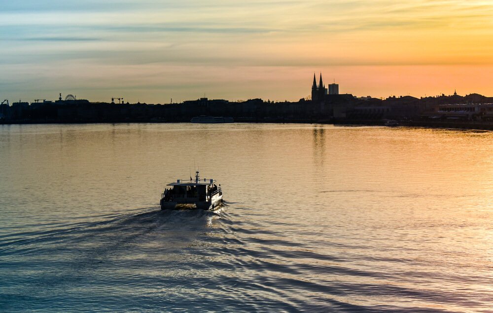 water taxi boat, taxi bus, returning to port of the city of Bordeaux (France)
