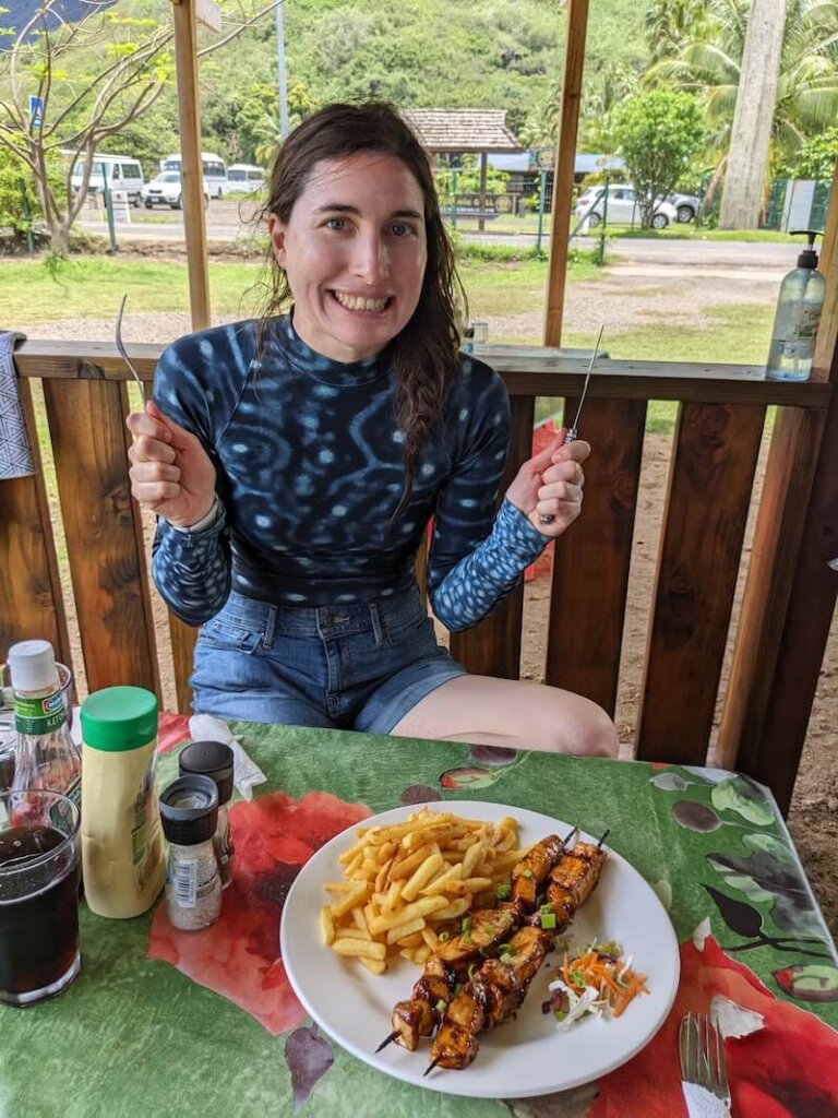 Allison with a plate of skewers at a local roulotte