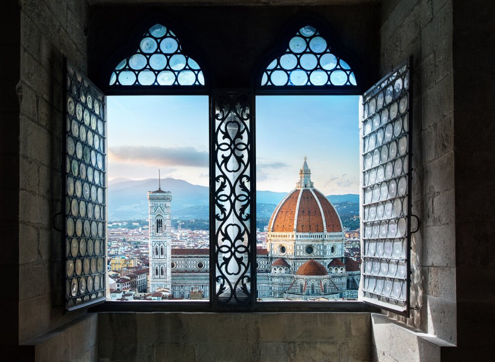 view of the duomo in florence from some windows