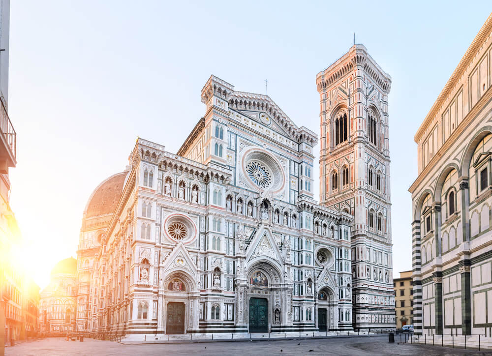 The facade of the florence duomo at sunrise