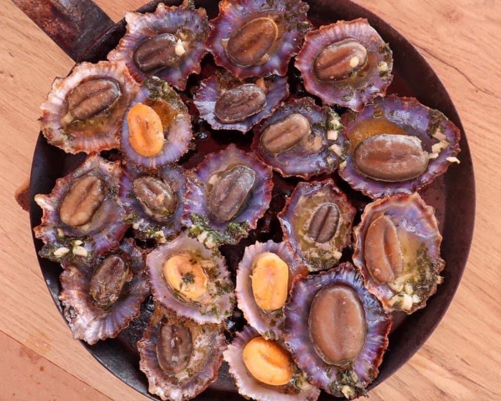 A plate of seafood tapas in Madeira served on the half shell