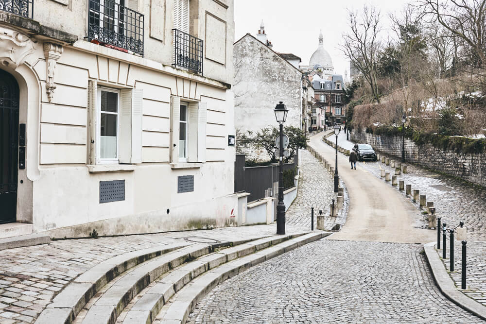 the paris winter streets in montmartre with a little bit of snow