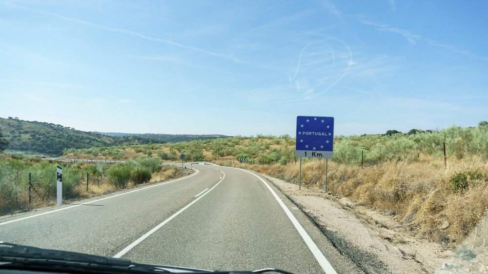 Spain Crossing Border Portugal Sign Highway, one kilometer from the border of portugal on a road