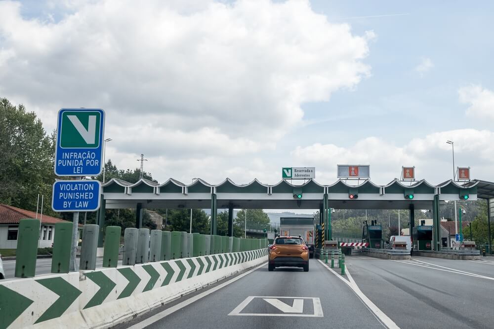 Image of section of the A3 motorway, Portuguese motorway that connects Minho, Valença to the Douro coastline Tolls, fees section. "Reserved for members", "Violation punished by law"