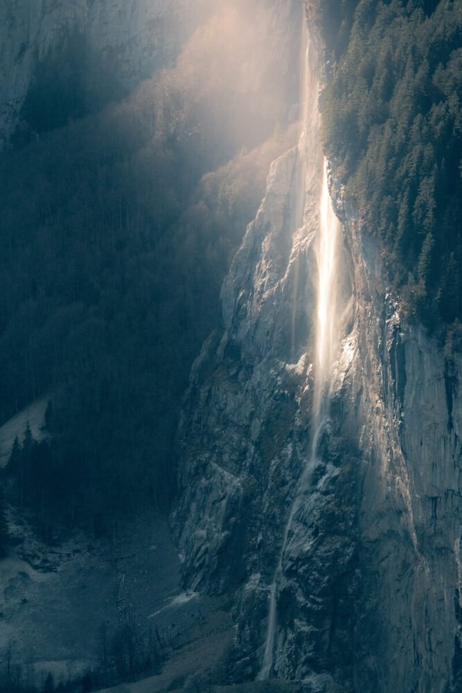 impressive Staubbachfall Waterfall in Lauterbrunnen Valley over the Mürrenflue
