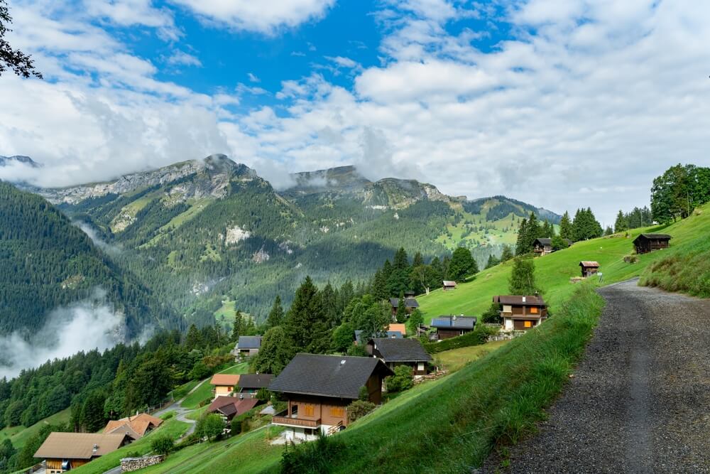 Views along the trail on the path up to Leiterhorn, Beautiful villages in switzerland. View from Wengen to Leiterhorn.
