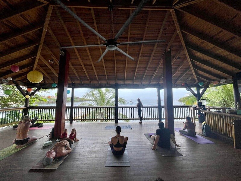 yoga with a view of the sea at sundowners in west end