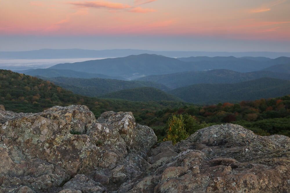sunrise at bearfence mountain with pink sky