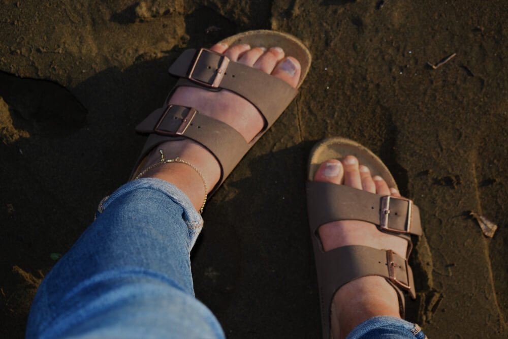 brown birkenstock sandals with two straps slide on style