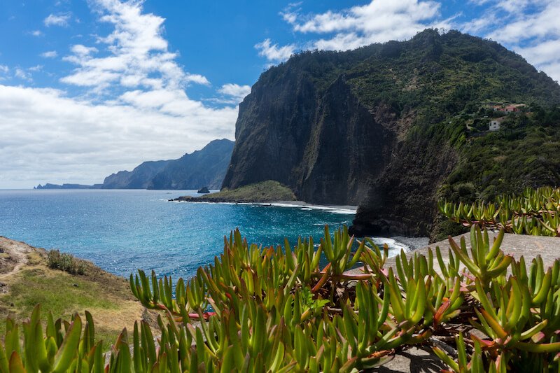 the stunning view from Miradouro do Guindaste with high cliffs facing the atlantic ocean, Madeira Island