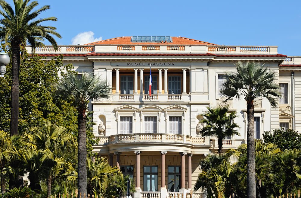 the historic musee massena with a villa like structure and palm trees in central nice