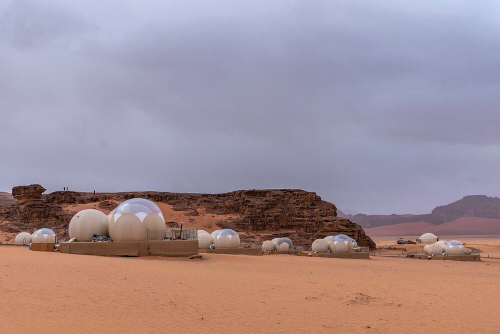 a comfortable wadi rum bubble hotel for glamping in jordan on a cloudy day