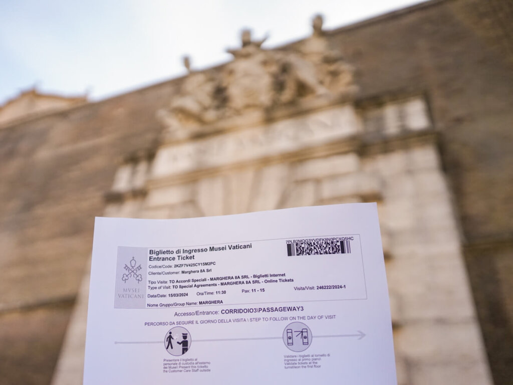 Allison holding up her ticket to the Vatican Museum for March 2024 visit