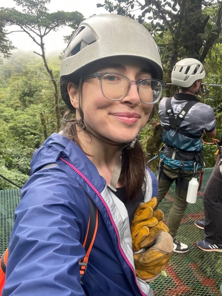 allison green smiling in monteverde in the cloud forest going ziplining on a monteverde canopy tour