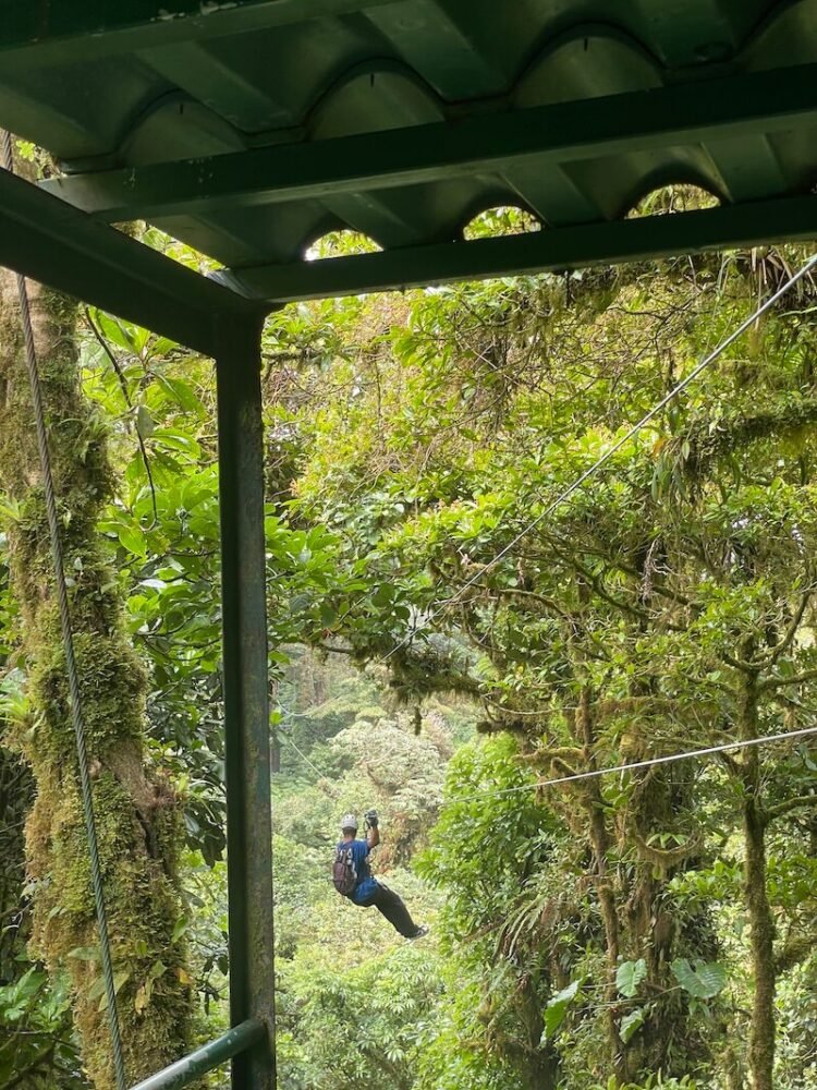 person ziplining on a monteverde canopy tour