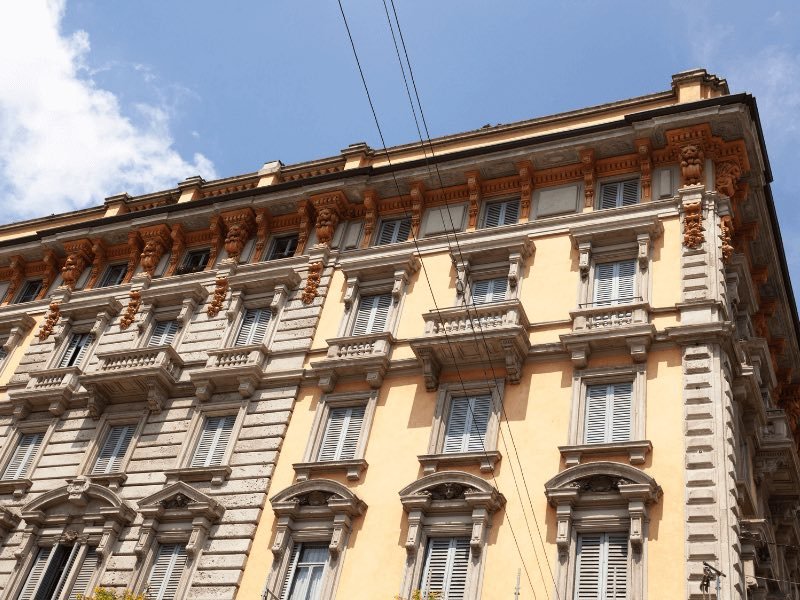 one of the buildings in milans porto venizia area a popular place to stay in milan for families