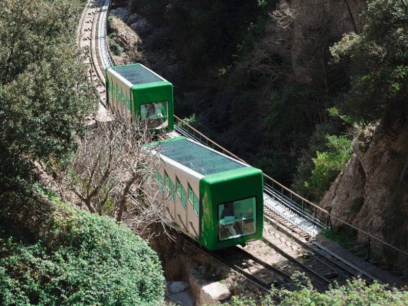 montserrat area with a cogwheel training coming up the mountain