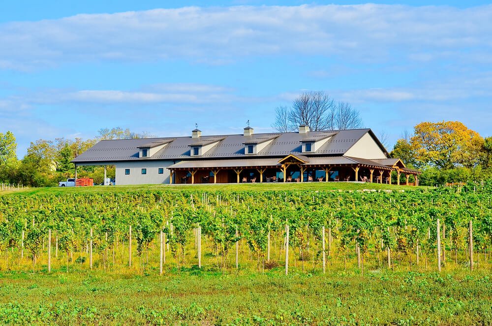 Vineyard and winery building with beautiful porch, located on the eastern shore of Cayuga Lake