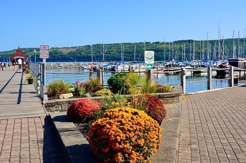 Waterfront visitors enjoy a picturesque view from the Harbor Park at Watkins Glen.
