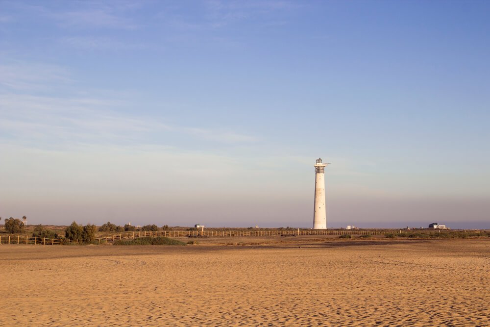 Matorral beach and lighthouse in Morro Jable, Fuerteventura, Canary islands, Spain