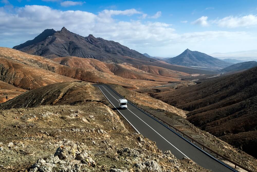 Traveling along the most spectacular road in the island of Fuerteventura on a motor home, Canary Islands, Spain
