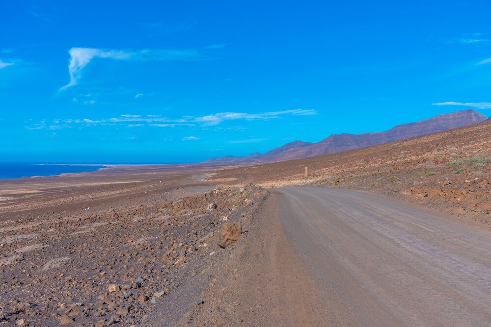 Road passing through Jandia peninsula at Fuerteventura, Canary islands, Spain.
