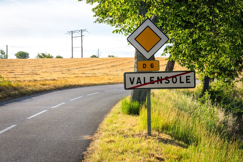 road sign indicating that you are leaving valensole on the road in provence