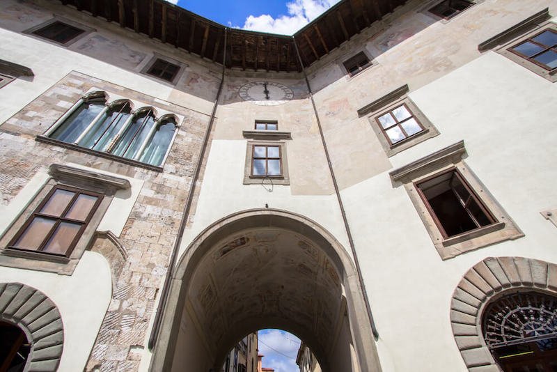 Torre della Muda with its arches and clock at the very top