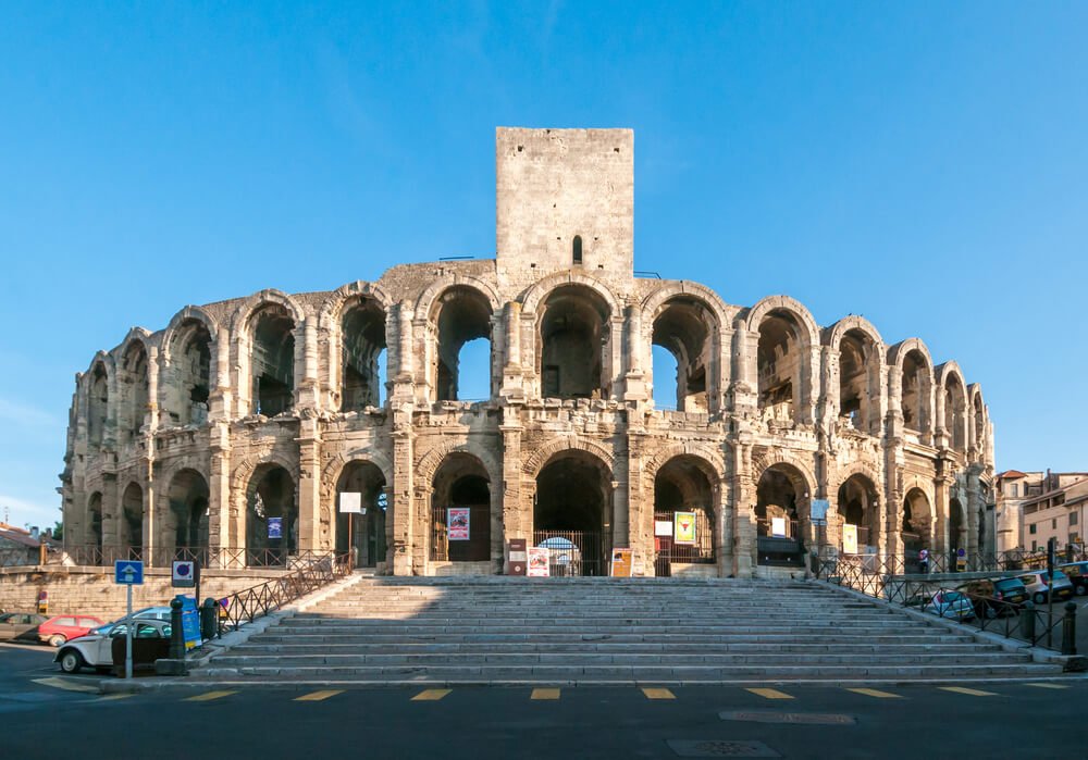 The Arles Amphitheatre, Roman arena in French town of Arles, with sunlight falling on it beautifully