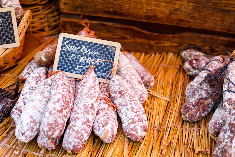 arles saucisson for sale at a market