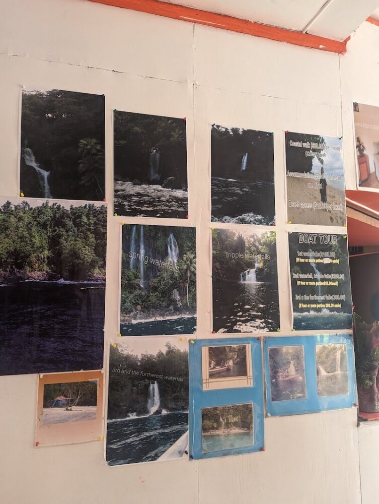 signs showing the different waterfalls and prices for the waterfall boat trips 