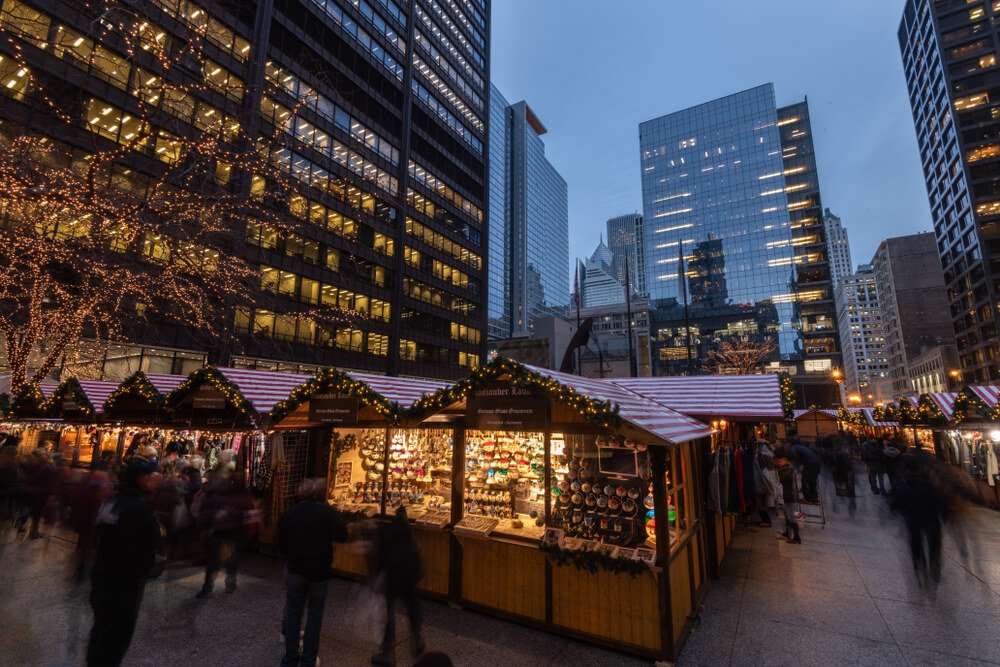 people in chicago enjoying the german style christmas market in the heart of town