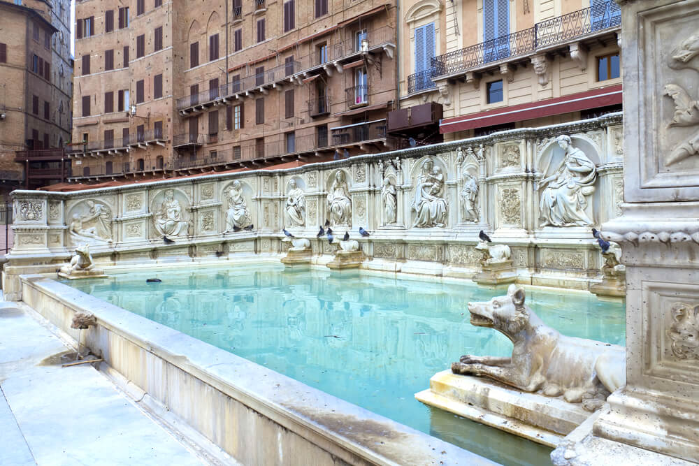 Detailed view of the marble fountain called Fonte Gaia (which is Italian for Fountain of Joy), part of Piazza del Campo in Siena