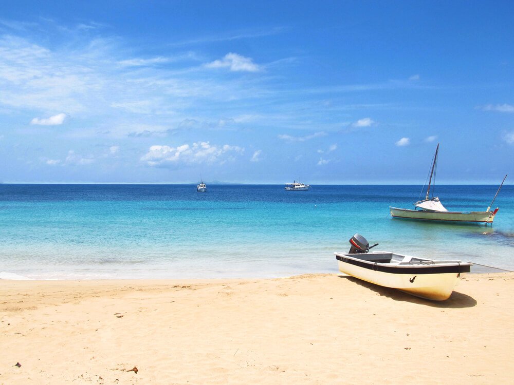 boats in little corn in the ocean