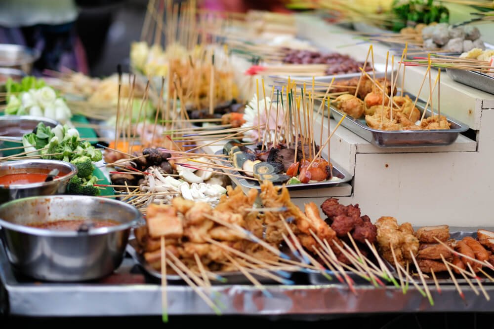 different kinds of foods on skewers for sale in malaysia