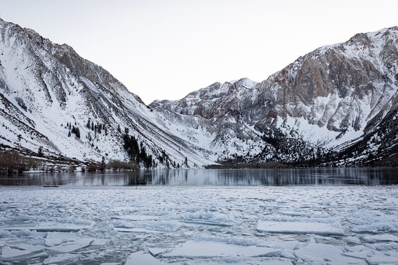 mammoth lakes winter at convict lake with snow and broken up frozen ice on the lake