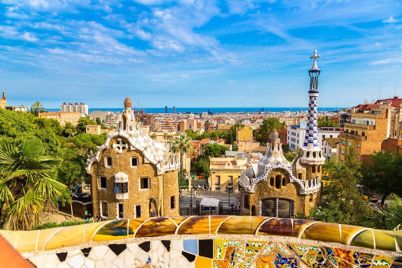 Park Guell by architect Gaudi in a summer day in Barcelona, Spain with whimsical mosaics and architecture