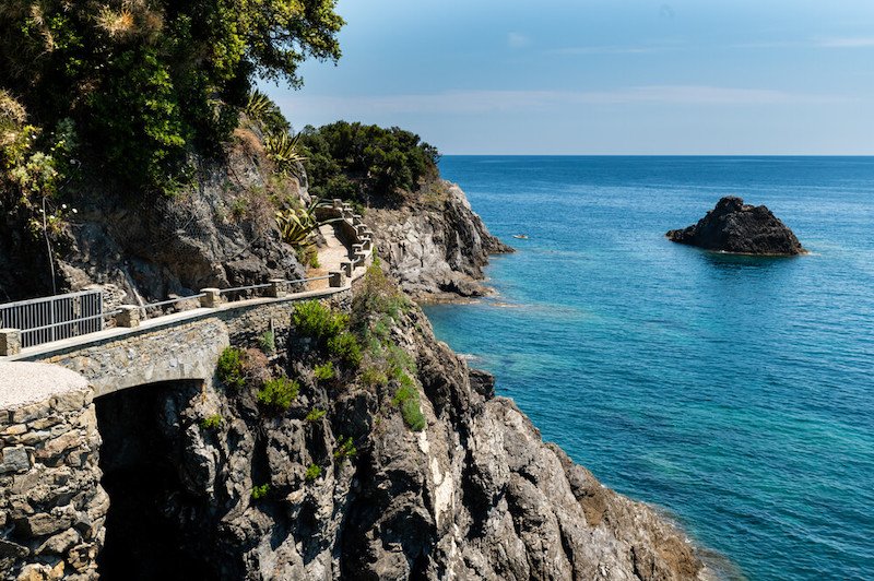 Monterosso, Liguria, Italy, June 2020. La via dell'amore panoramic path that connects the Cinque Terre: an amazing corner of coast with crystal clear waters and wild nature, on a clear summer day