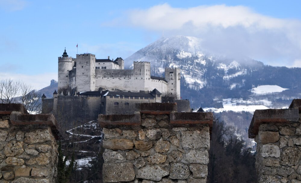 Winter landscape and medieval fortress on top of the mountain. Hohensalzburg Fortress. Austria.
