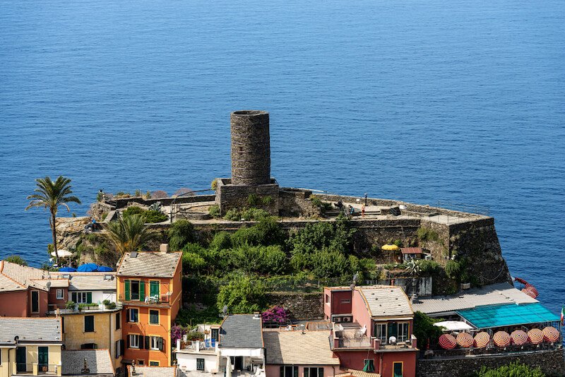 The remaining tower of the Doria castle, which was an ancient lookout tower, overlooking the blue sea in the town of Vernazza