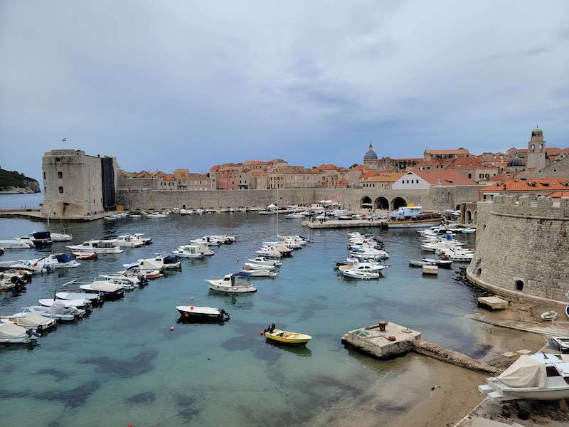 View of boats in the harbor of dubrovnik on an overcast day in the winter in europe